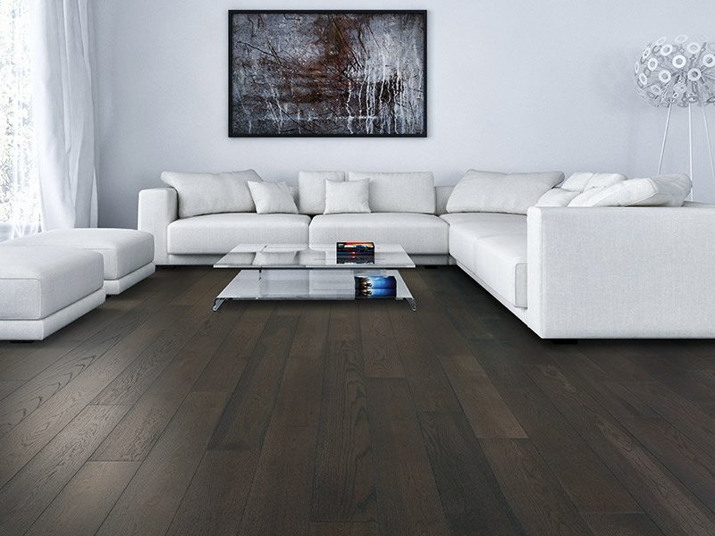 white sofa on a brown hardwood floors from The Carpet Shoppe in Steamboat Springs, CO